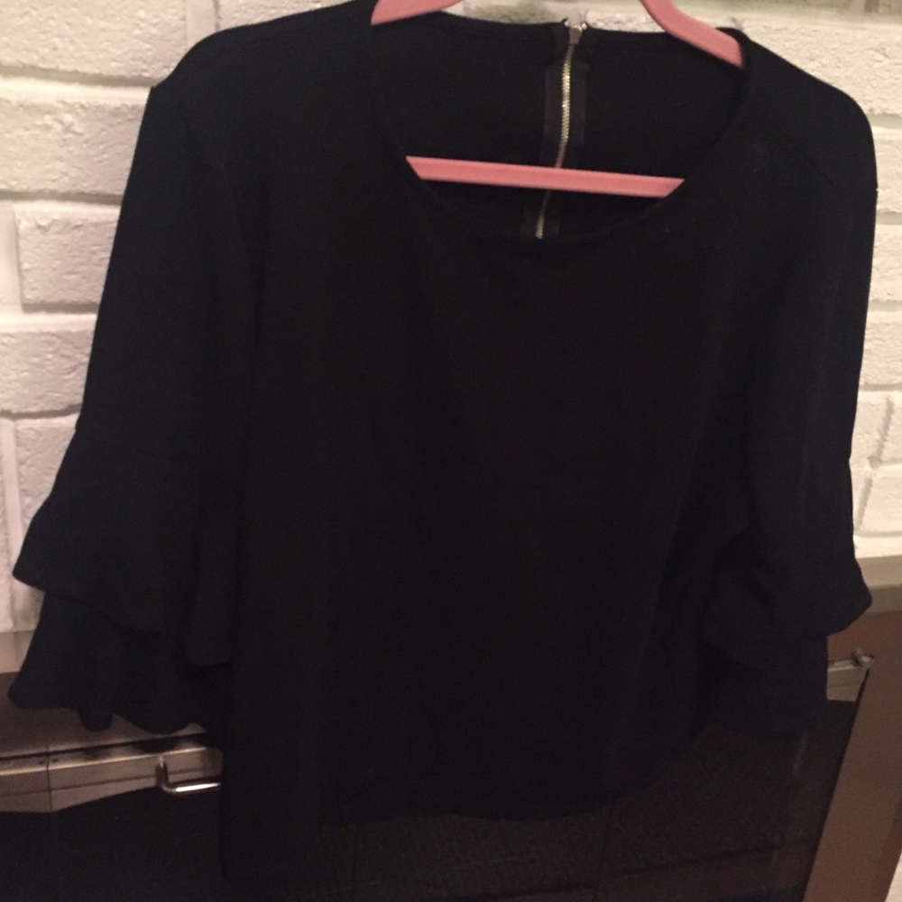 Top with bell sleeves
